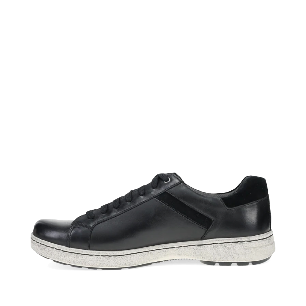 Side (left) view of Dansko Trevor Leather Tie Sneaker for men.
