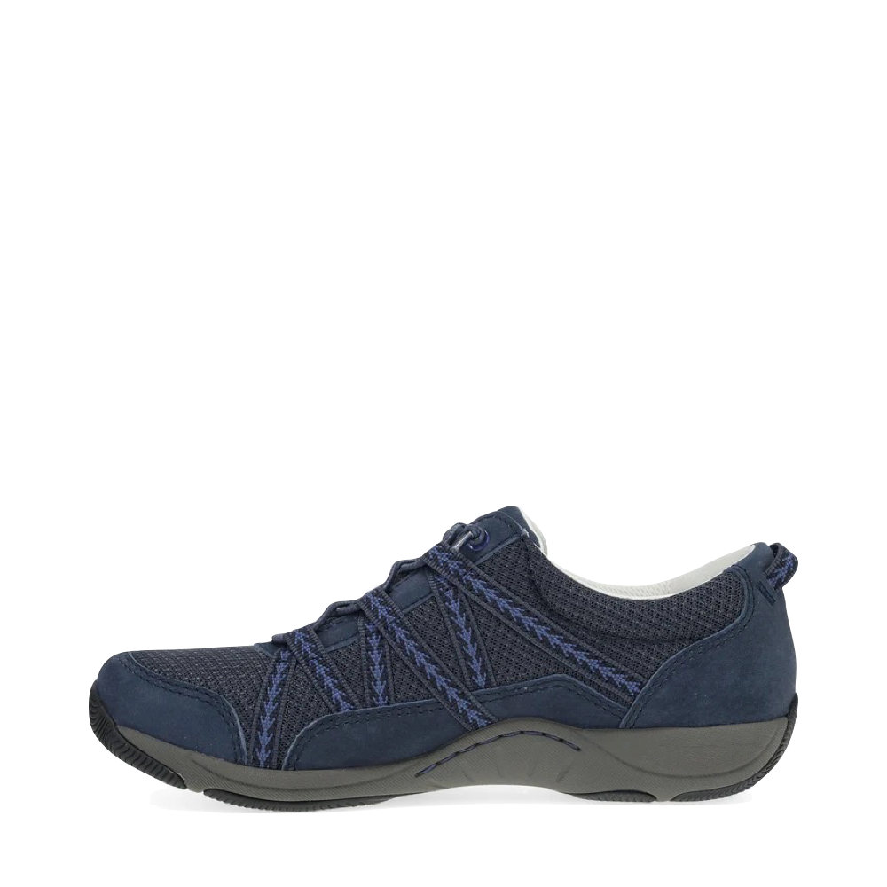 Side (left) view of Dansko Harlyn Slip On Sneaker for women.