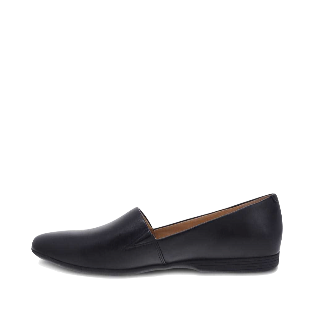 Side (left) view of Dansko Larisa Leather Flat Slip On Loafer for women.