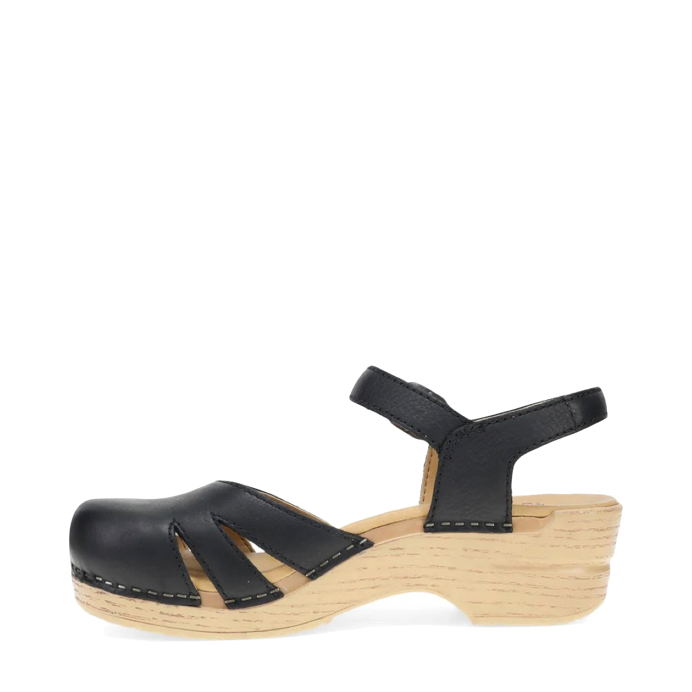 Side (left) view of Dansko Margreta Mary Jane Clog for women.