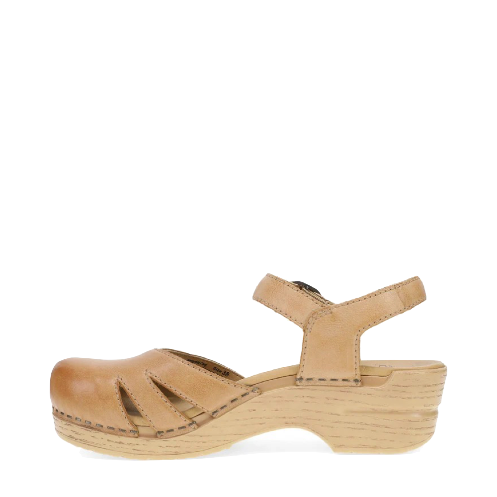 Side (left) view of Dansko Margreta Mary Jane Clog for women.