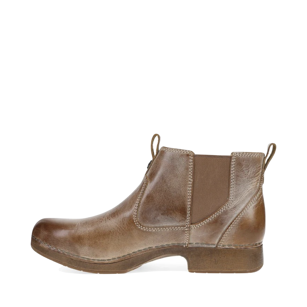 Side (left) view of Dansko Michele Pull On Leather Boot for women.