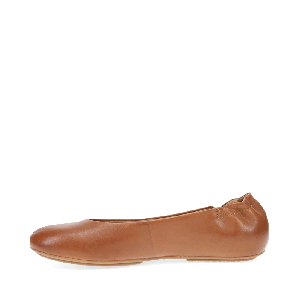 Side (left) view of Dansko Mollie Slip On Flat for women.
