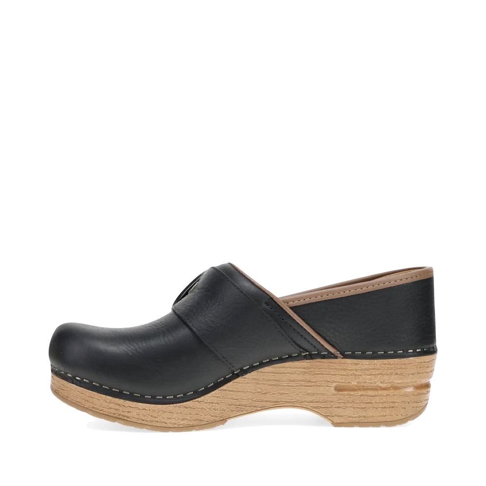Side (left) view of Dansko Pearson Buckle Clog for women.
