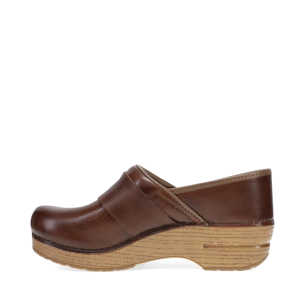 Side (left) view of Dansko Pearson Buckle Clog for women.