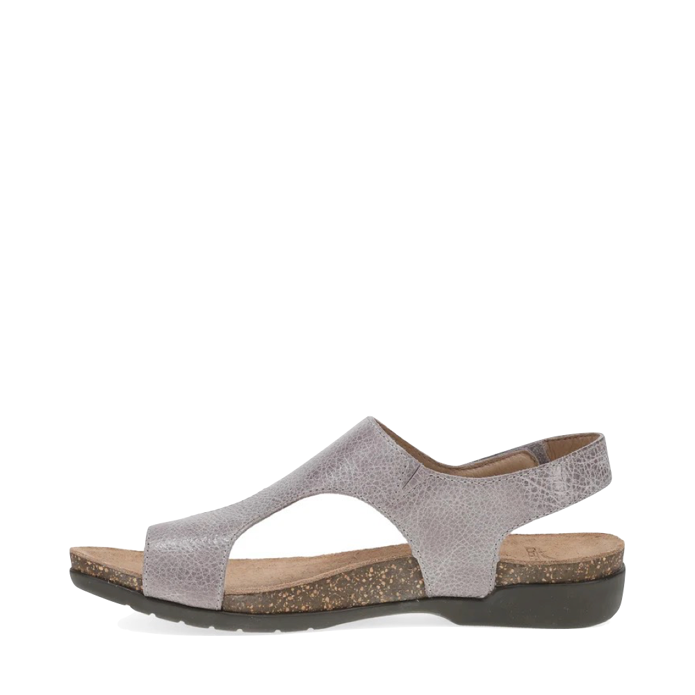 Side (left) view of Dansko Reece Thong Sandal for women.