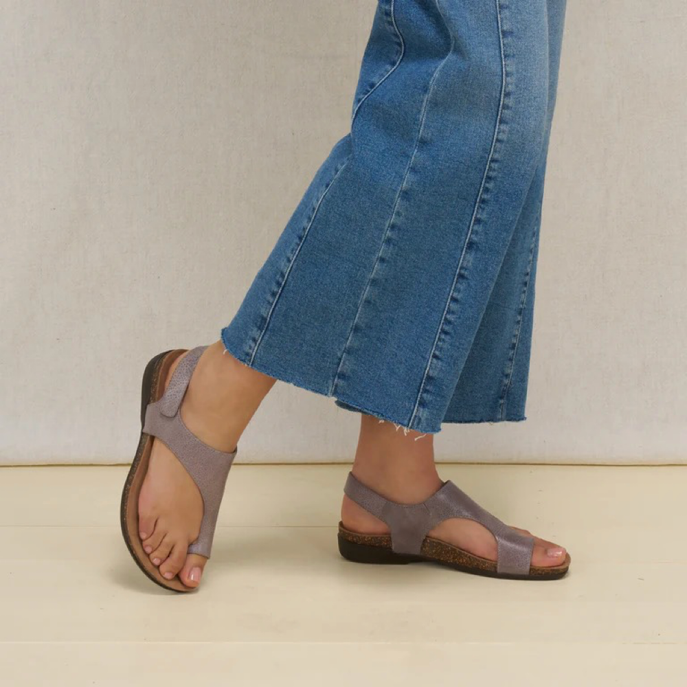Model view of Dansko Reece Thong Sandal for women.