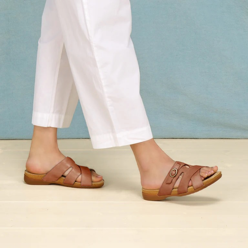 Model view of Dansko Regan Slide Sandal for women.