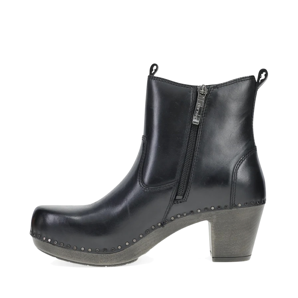 Side (left) view of Dansko Shayna Heeled Side Zip Leather Boot for women.