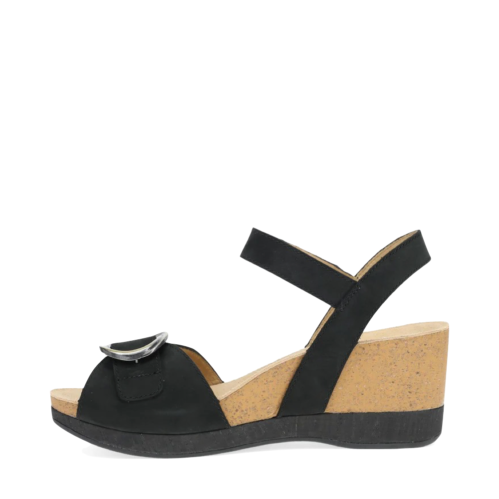 Side (left) view of Dansko Stella Wedge Sandal for women.