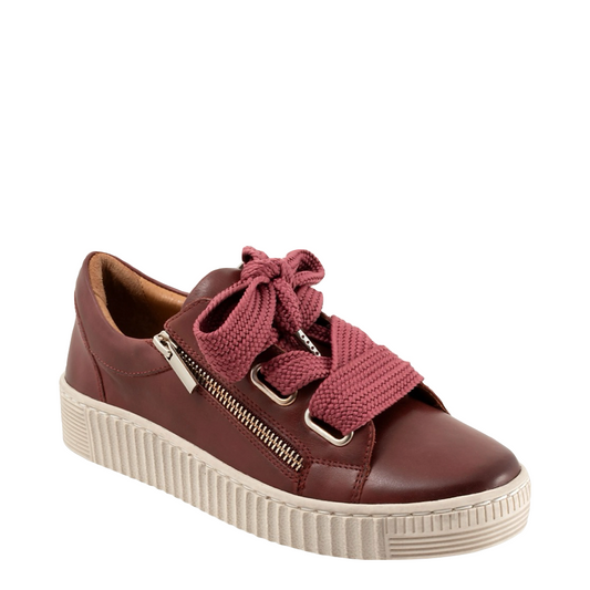 Mudguard and Toe view of EOS Footwear Jovi Leather Side Zip Lace Sneaker for women.