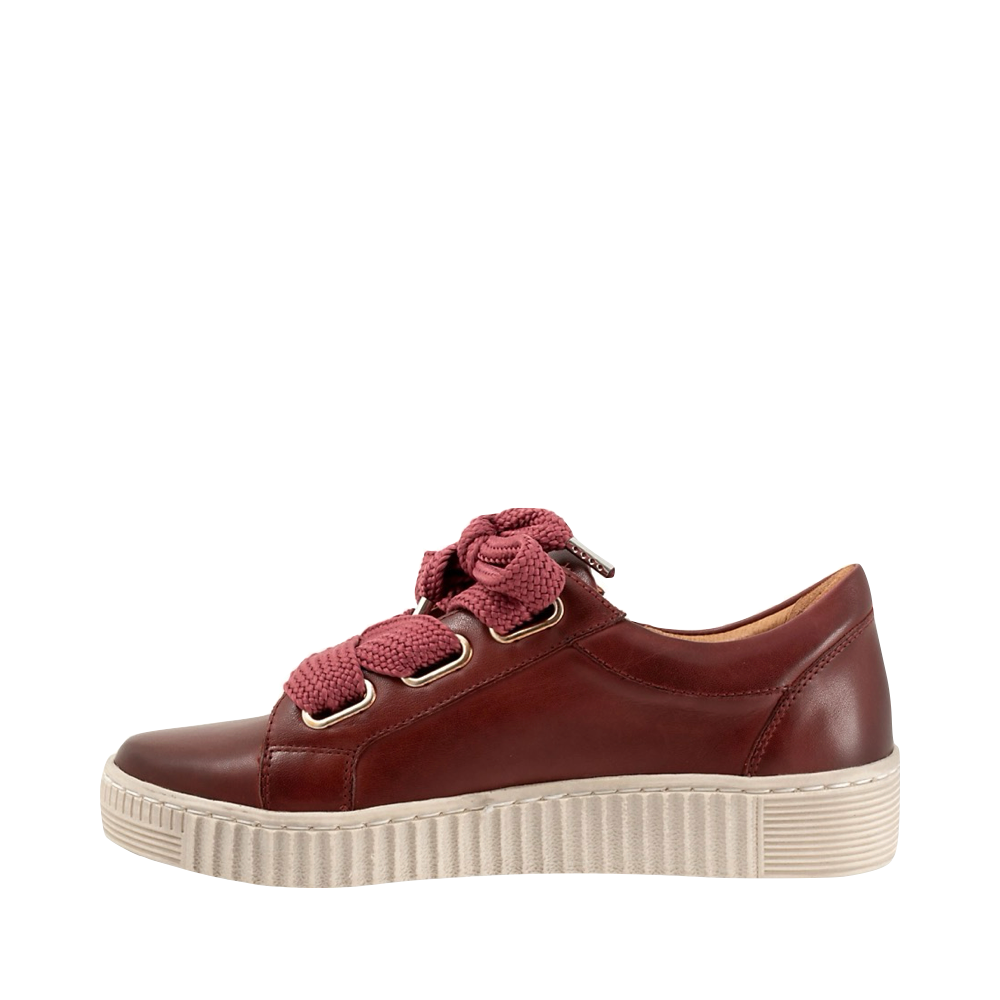 Side (left) view of EOS Footwear Jovi Leather Side Zip Lace Sneaker for women.