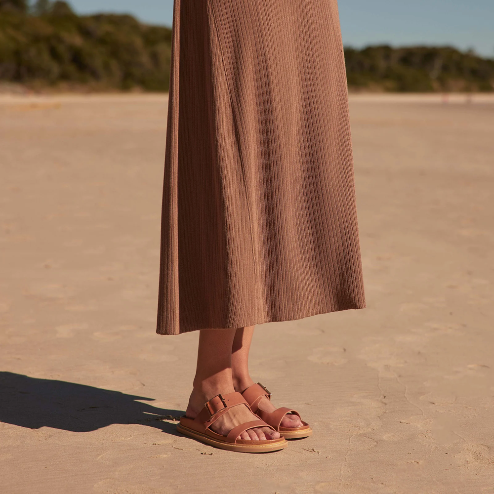 Model view of EOS Dedra Leather Slide Sandal for women.
