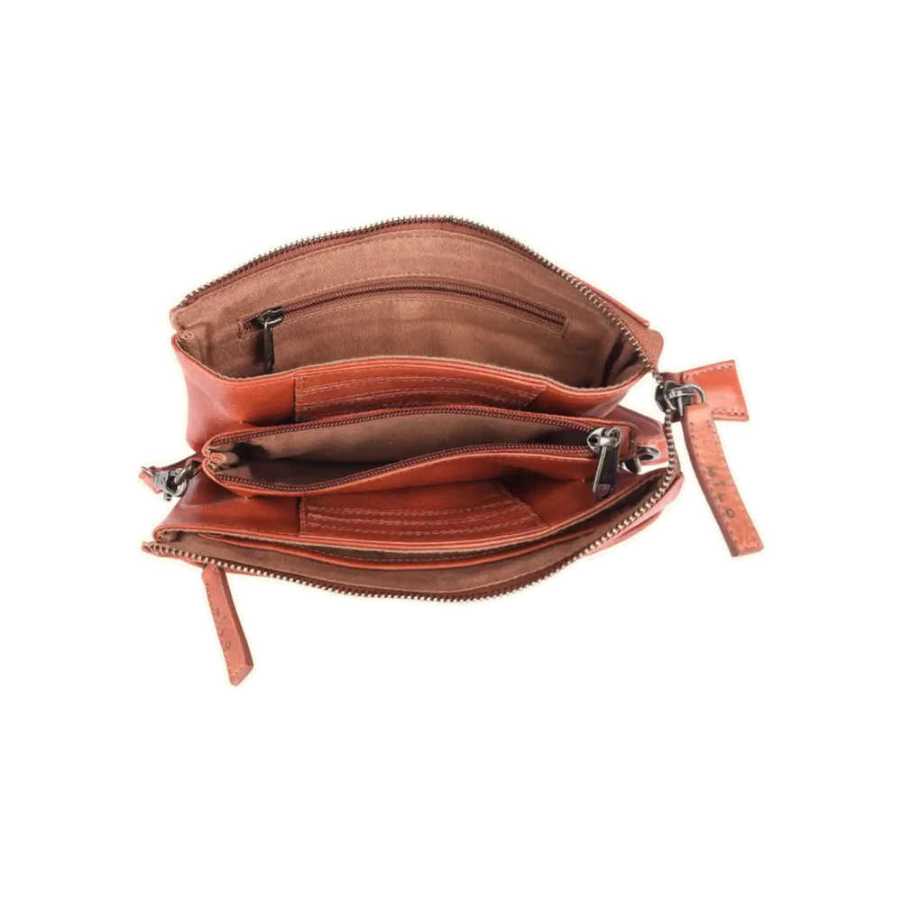 Top-down view of Milo Brisa Leather Crossbody Bag in cognac.