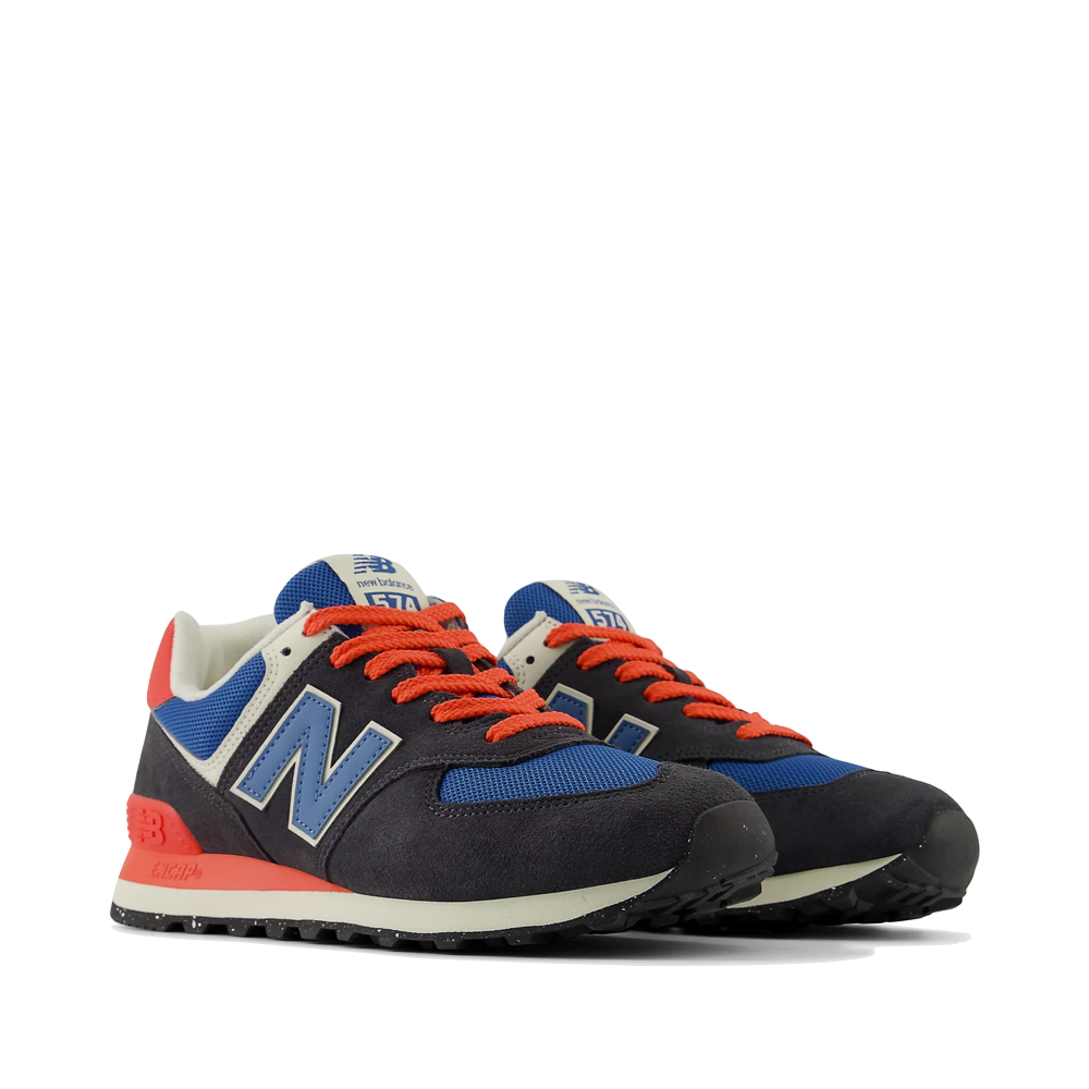Mudguard and Toe view of New Balance 574 Sneaker for men.