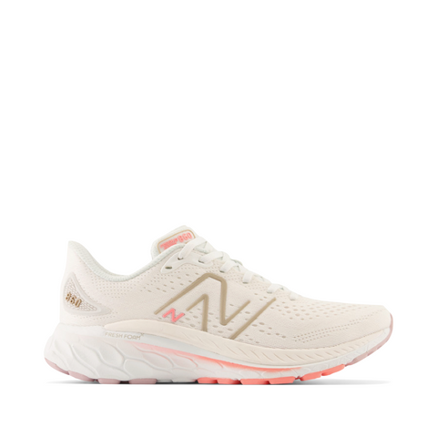 New Balance Women's Fresh Foam X 860v13 Sneaker in White with Light Gold Metallic and Grapefruit