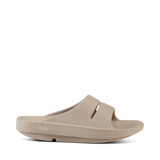 Side (right) view of OOfos OOahh Slide Sandal for women.