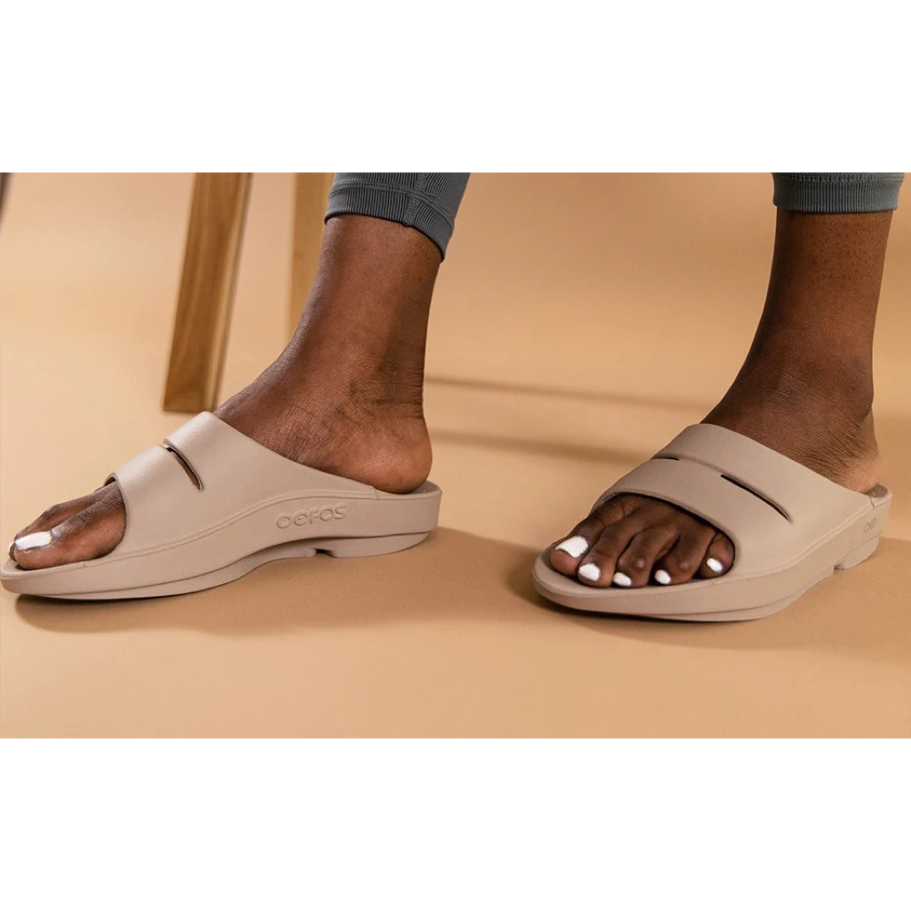 Model view of OOfos OOahh Slide Sandal for women.