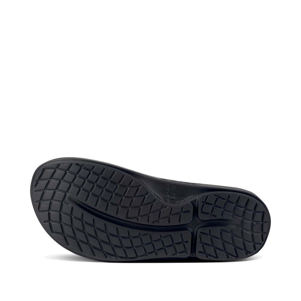 Bottom view of OOfos OOahh Sport Slide for women.