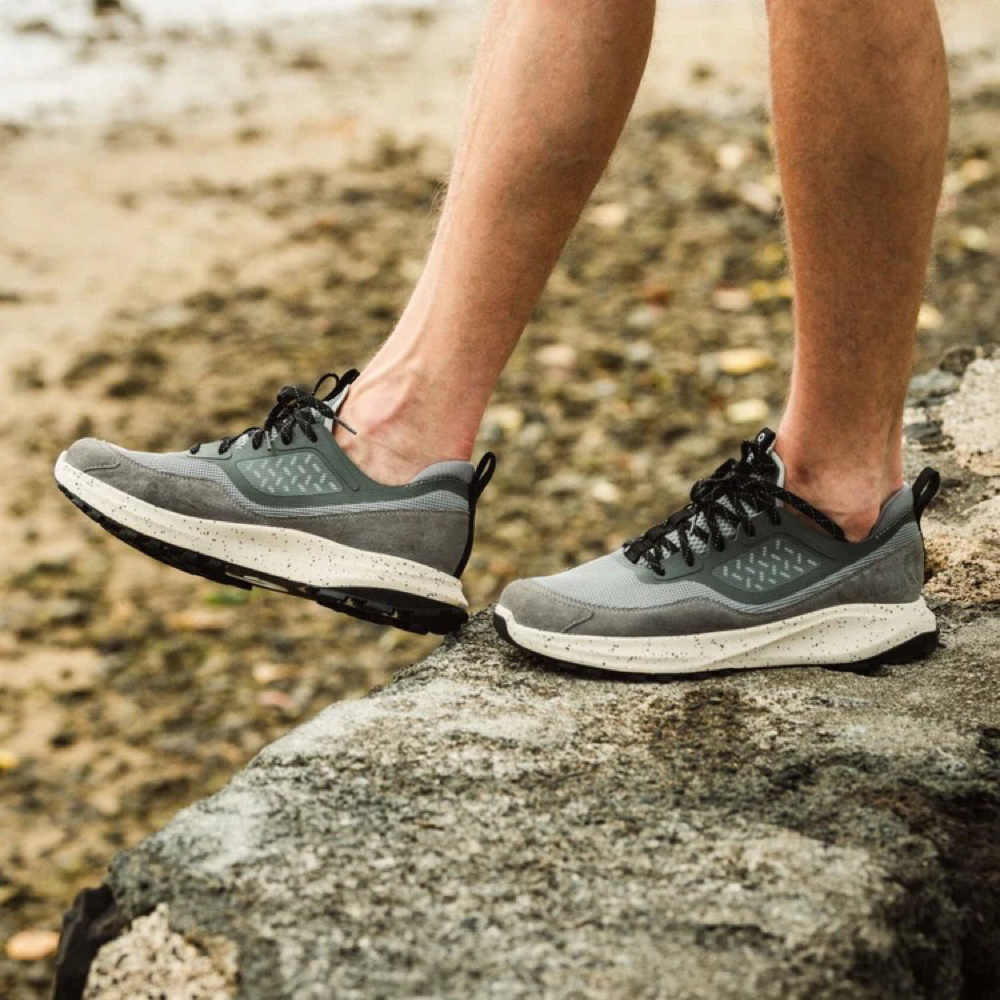 Model view of OluKai Makiki Sneaker for men.