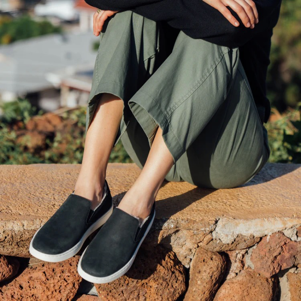 Model view of OluKai Pehuea Cozy Sneaker for women.