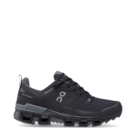 Side (right) view of On Cloudwander Waterproof Low Hiking Shoe for women.