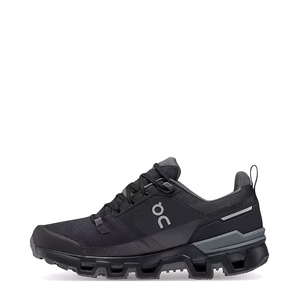 Side (left) view of On Cloudwander Waterproof Low Hiking Shoe for women.