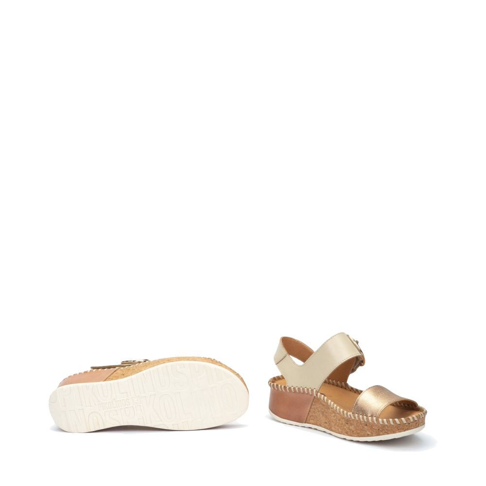Bottom and side view of Pikolinois Marina Sandal for women.