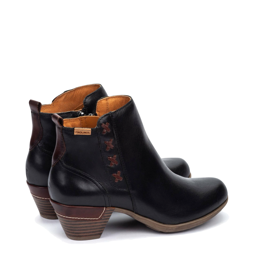 Heel view of Pikolinos Rotterdam 25 Leather Side Zip Ankle Boot for women.