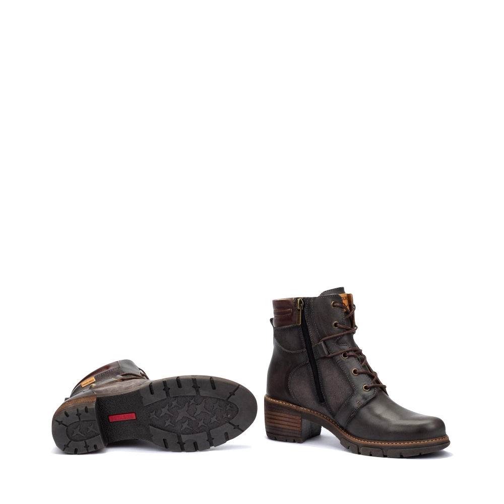Bottom and side view of Pikolinos San Sebastián Lace Boot for women.