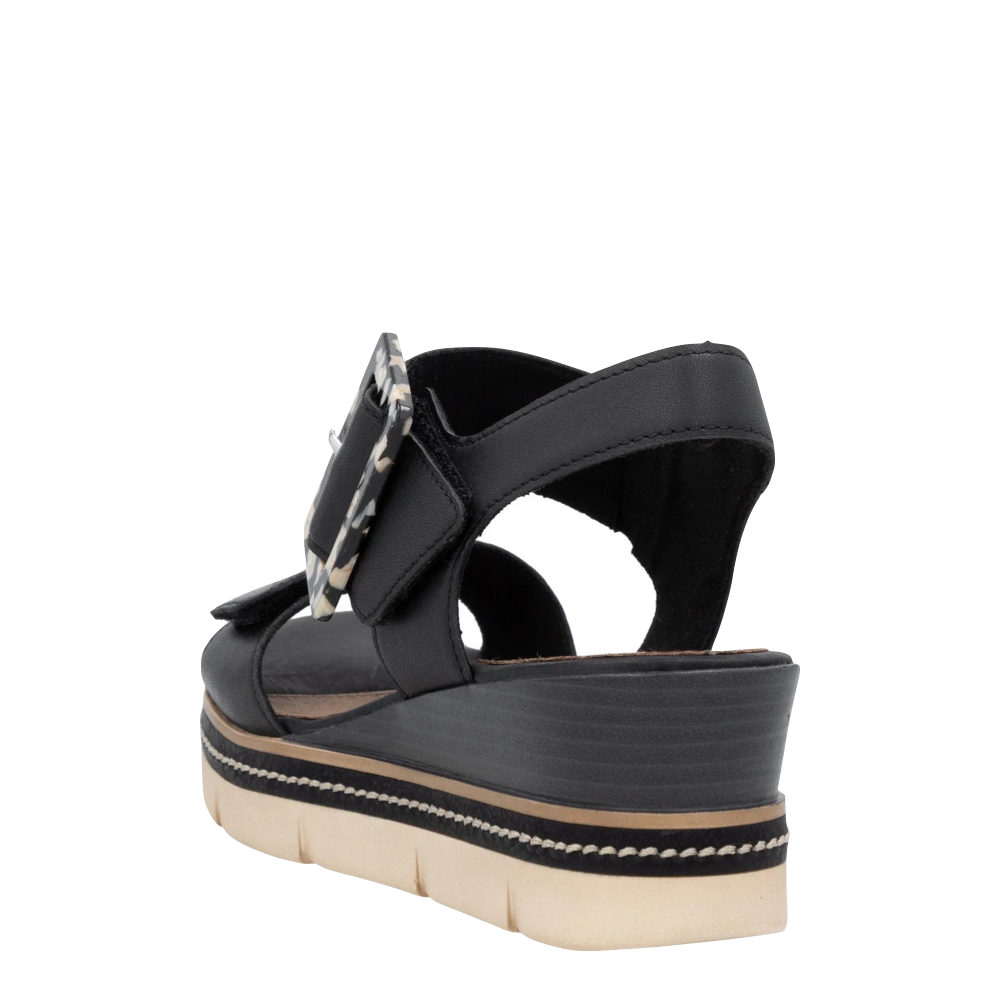 Heel view of Remonte Jerilyn 53 Wedge Sandal for women.
