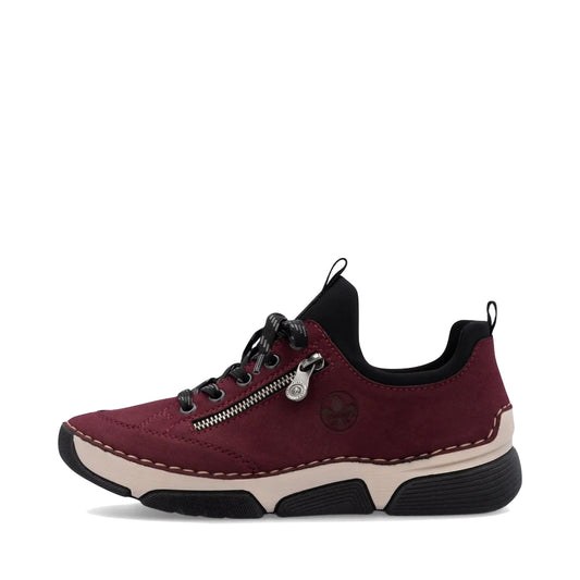 Side (left) view of Rieker Angela 73 Zip Lace Sneaker for women.