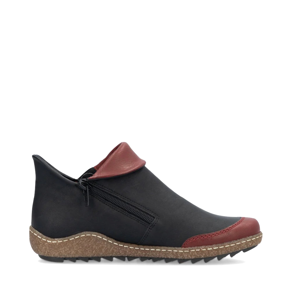 Side (right) view of Rieker Liv 82 Low Side Zip Boot for women.
