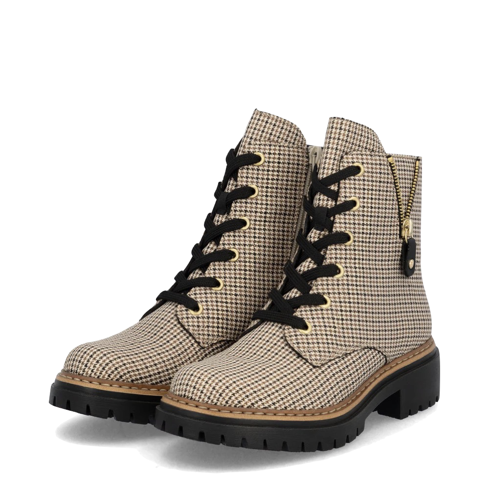 Mudguard and Toe view of Rieker Pearl 17 Plaid Side Zip Lace Boot for women.