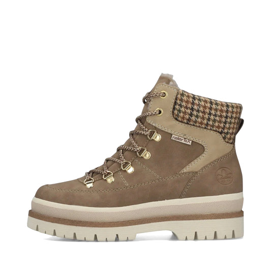 Side (left) view of Rieker Trudie 10 Side Zip Waterproof Lace Boot for women.