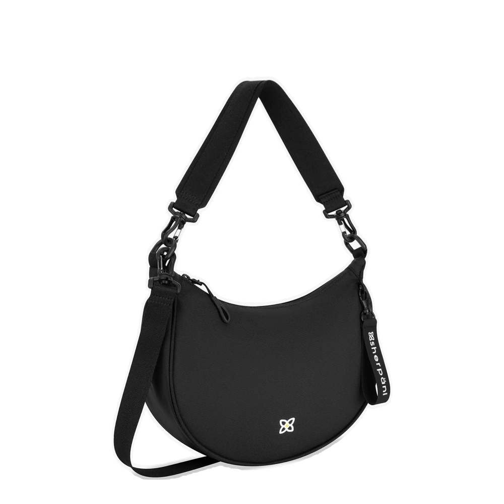 Front/side view of Sherpani Mina Crescent Crossbody Bag.