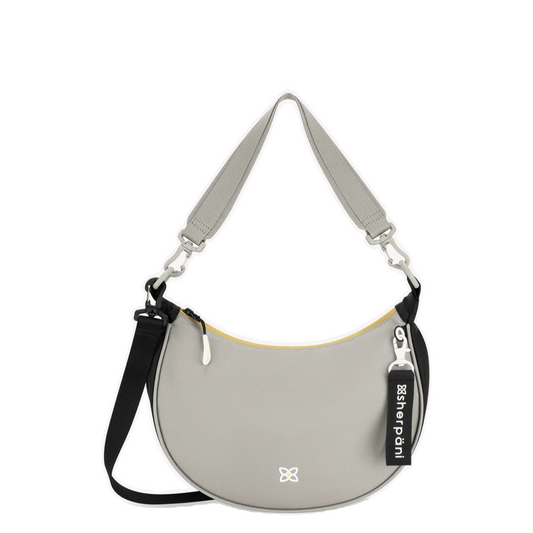 Front view of Sherpani Mina Crescent Crossbody Bag.