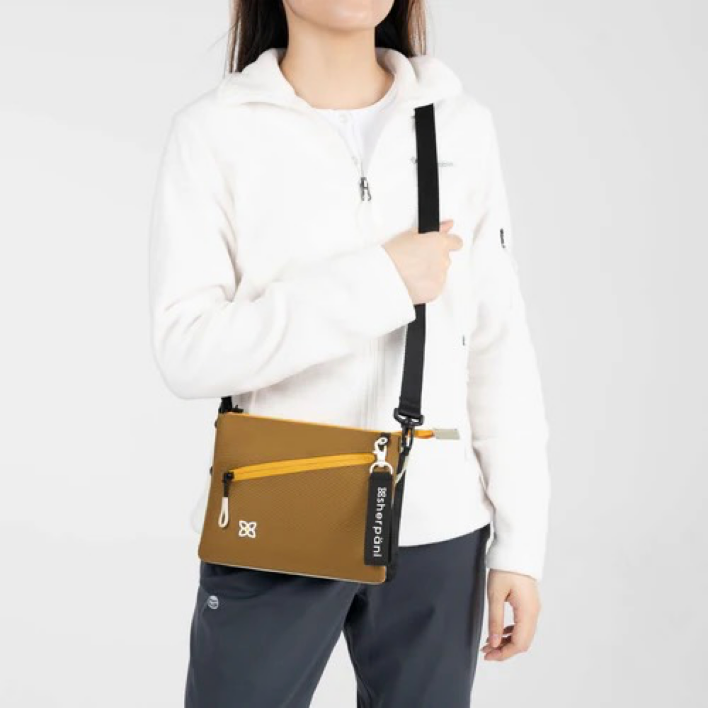 Model view of Sherpani Zoom Dual Pouch Crossbody Bag.