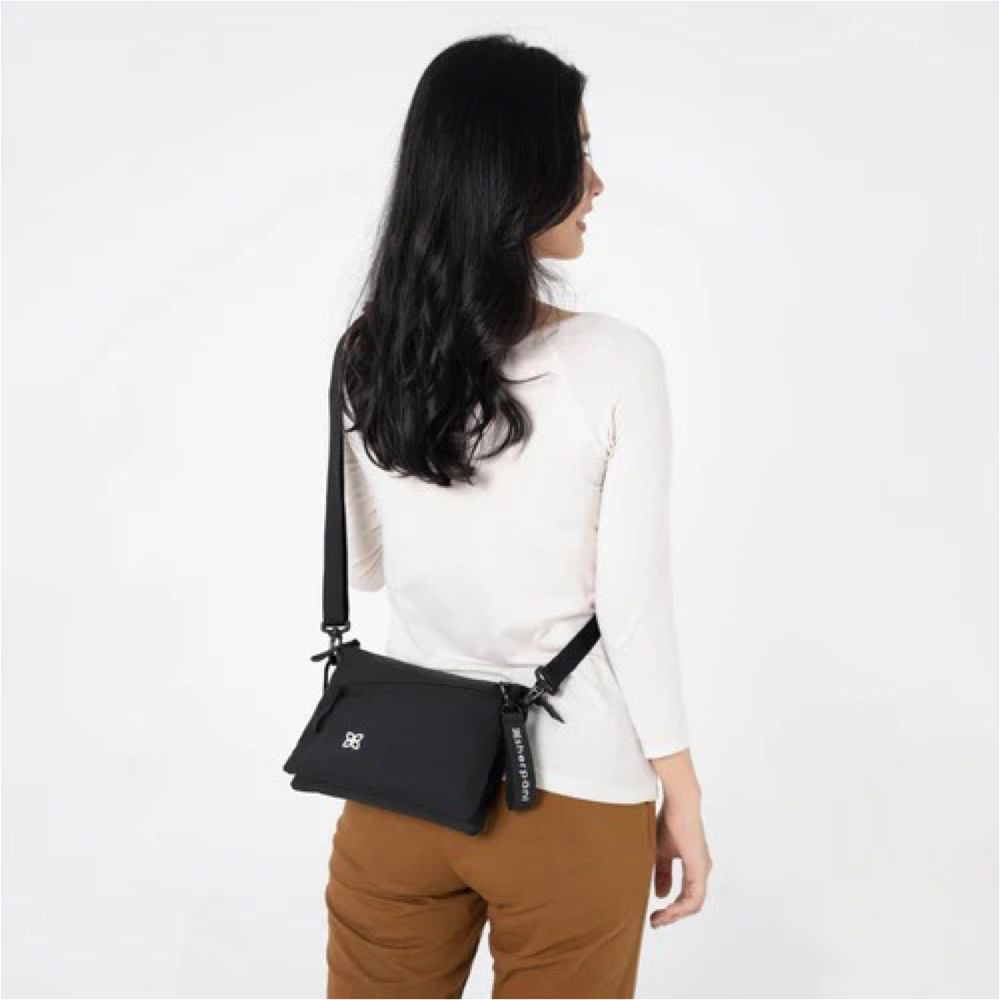 Model view of Sherpani Zoom Dual Pouch Crossbody Bag.