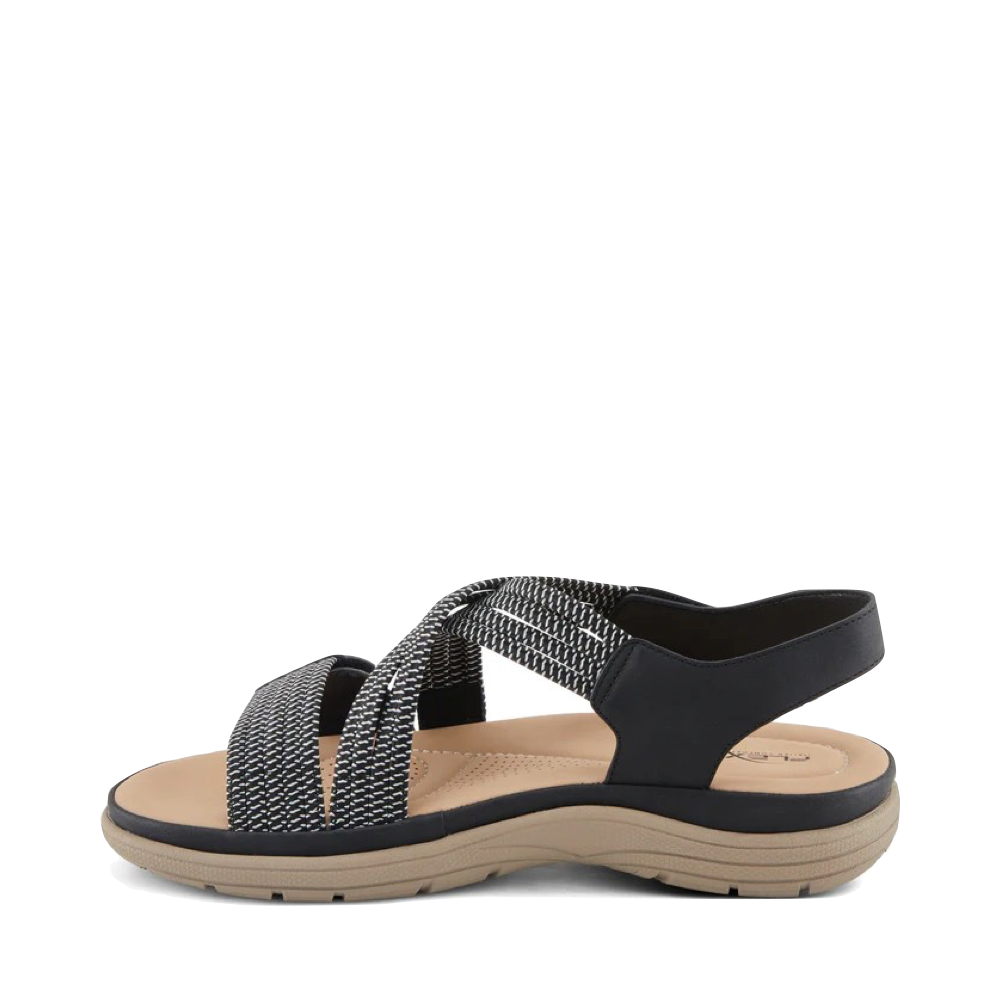Side (left) view of Spring Step Crossbeam Sandal for women.