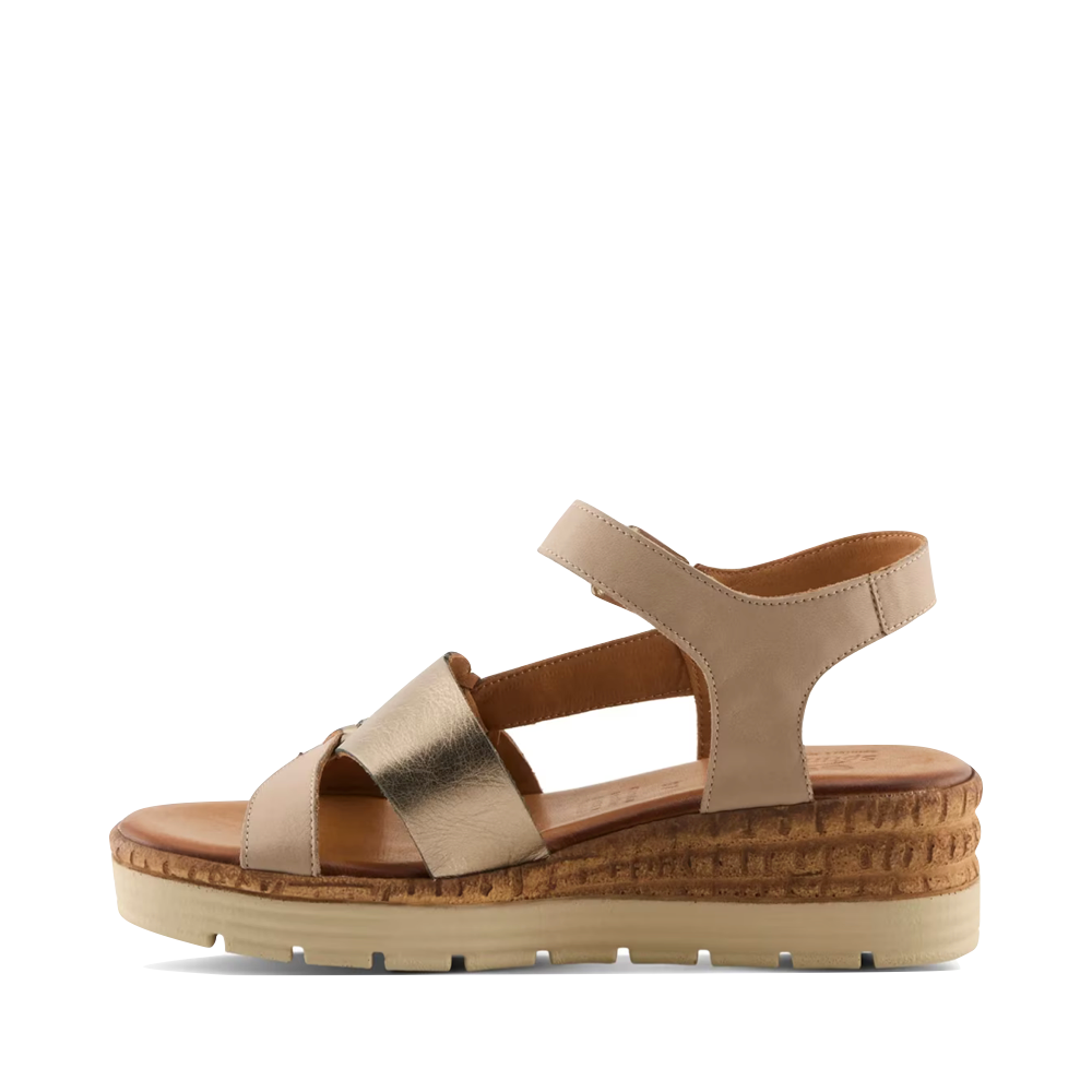 Side (left) view of Spring Step Kirra Wedge Sandal for women.