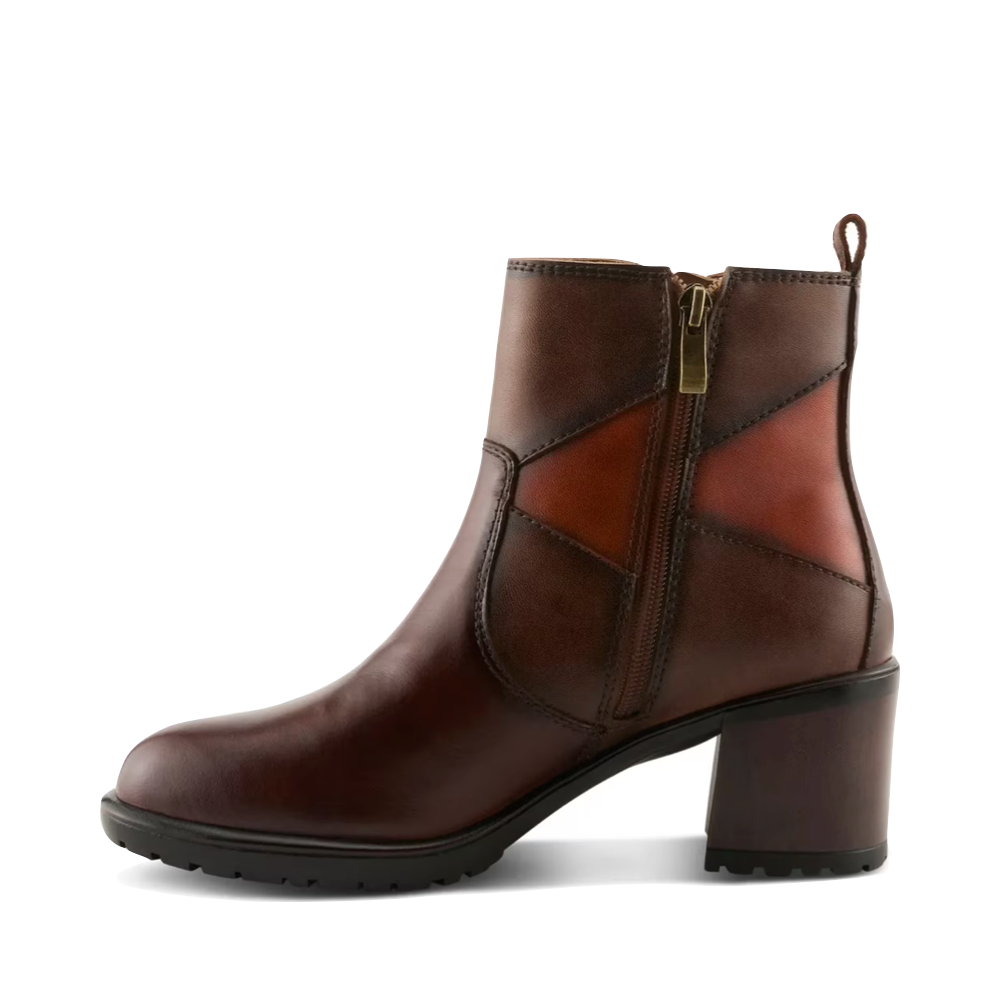 Side (left) view of Spring Step Patchpower Side Zip Boot for women.