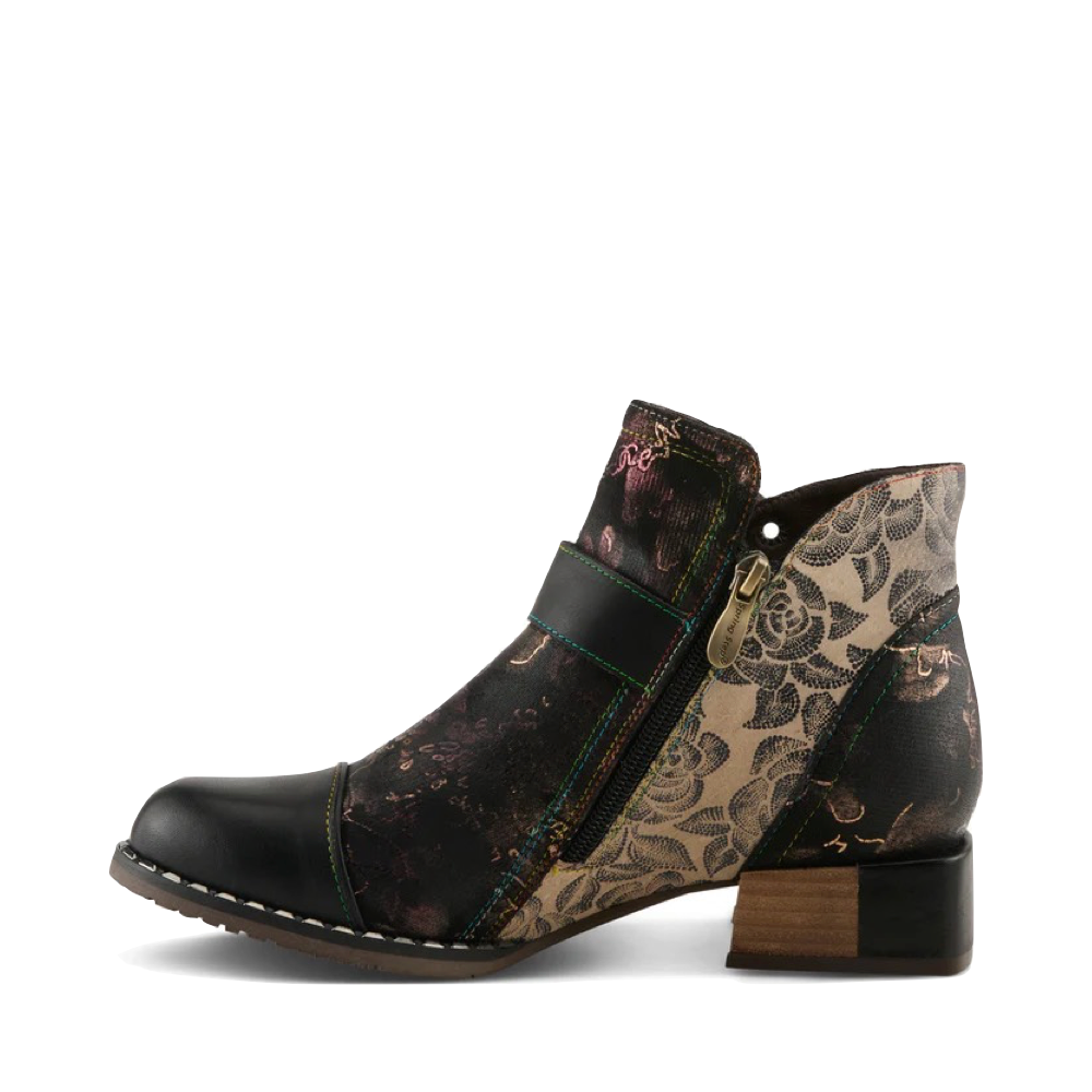 Side (left) view of Spring Step Sipperb Heeled Side Zip Boot for women.