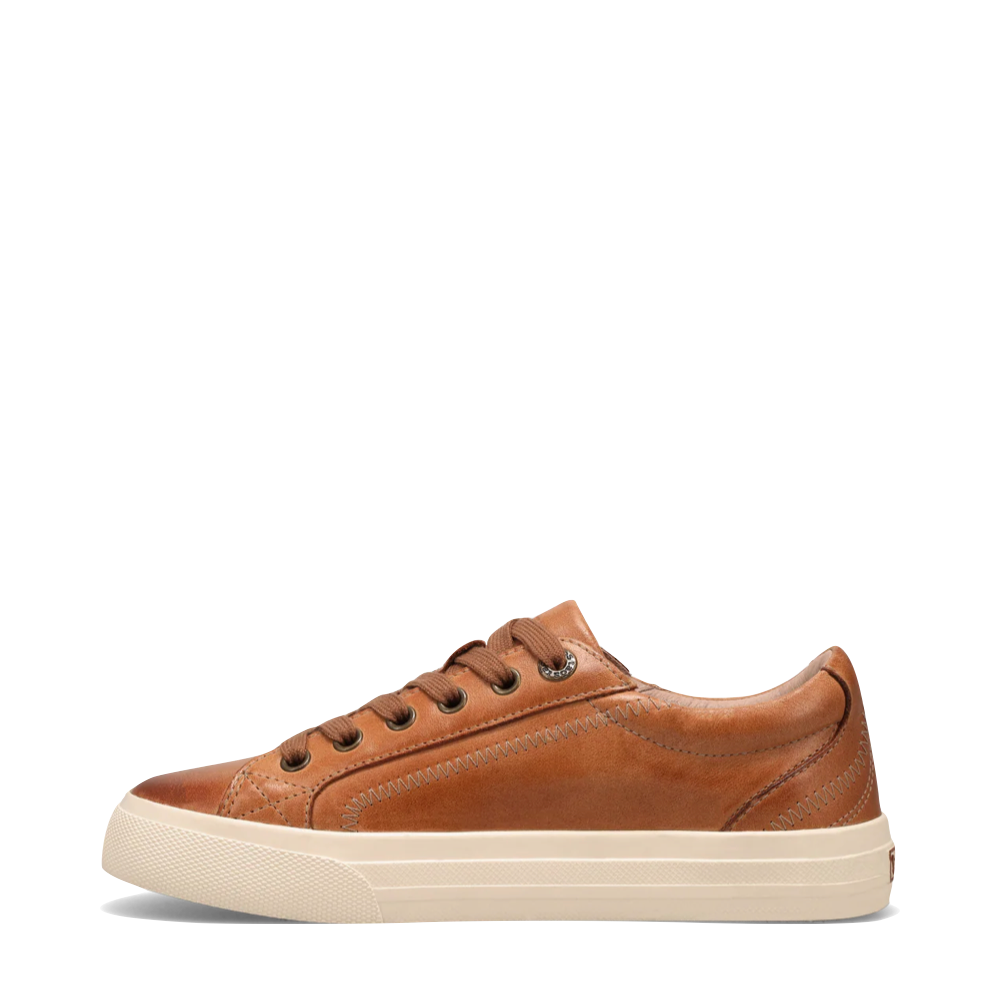 Side (left) view of Taos Plim Soul Lux Leather Sneaker for women.