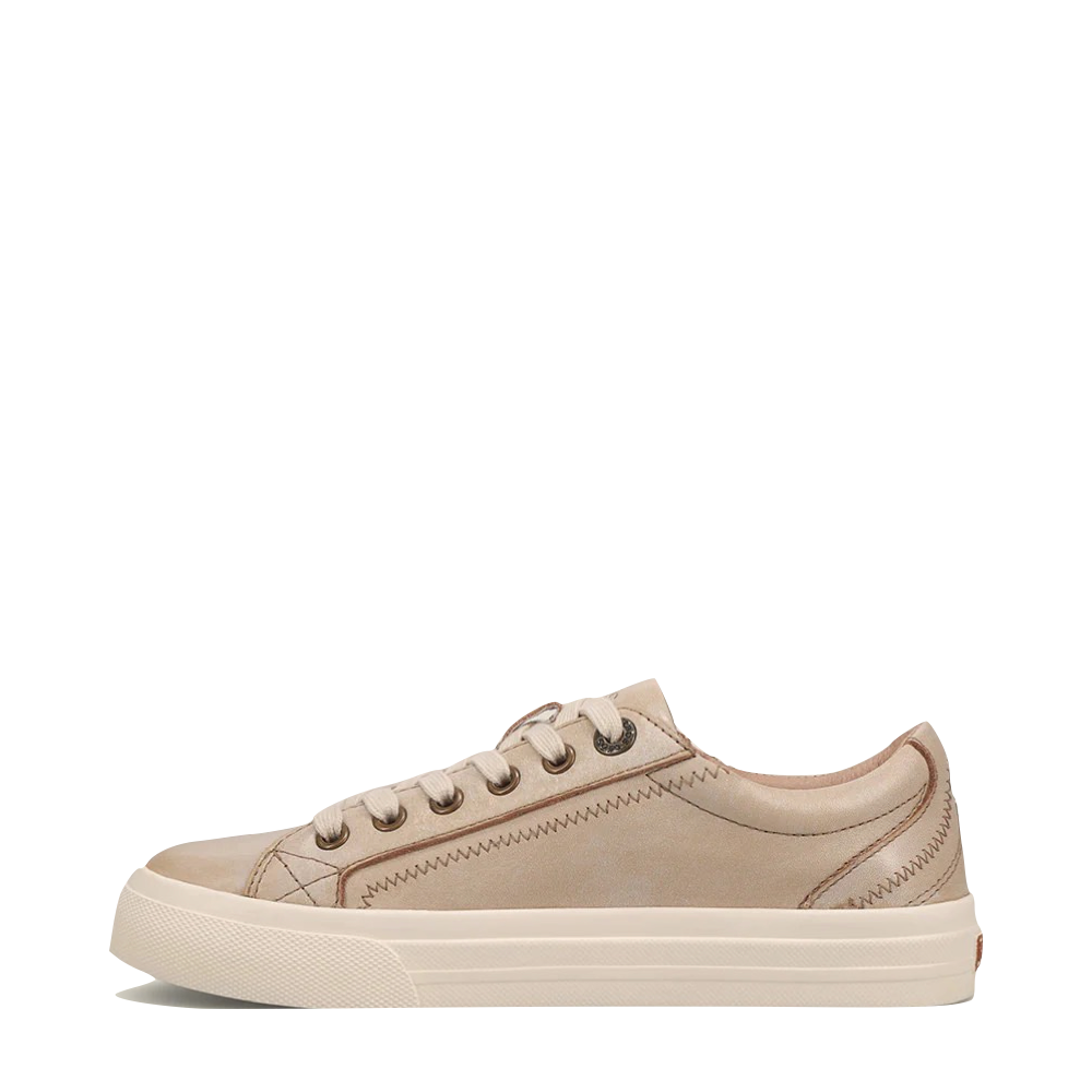 Side (left) view of Taos Plim Soul Lux Leather Sneaker for women.