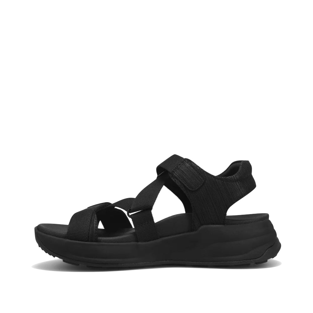 Side (left) view of Taos Super Z Sandal for women.
