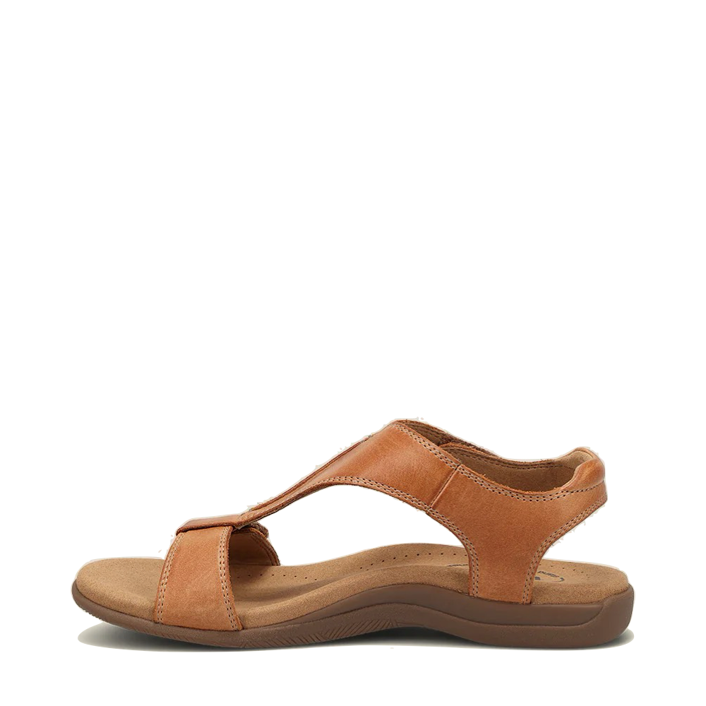 Side (left) view of Taos The Show Leather Sandal for women.