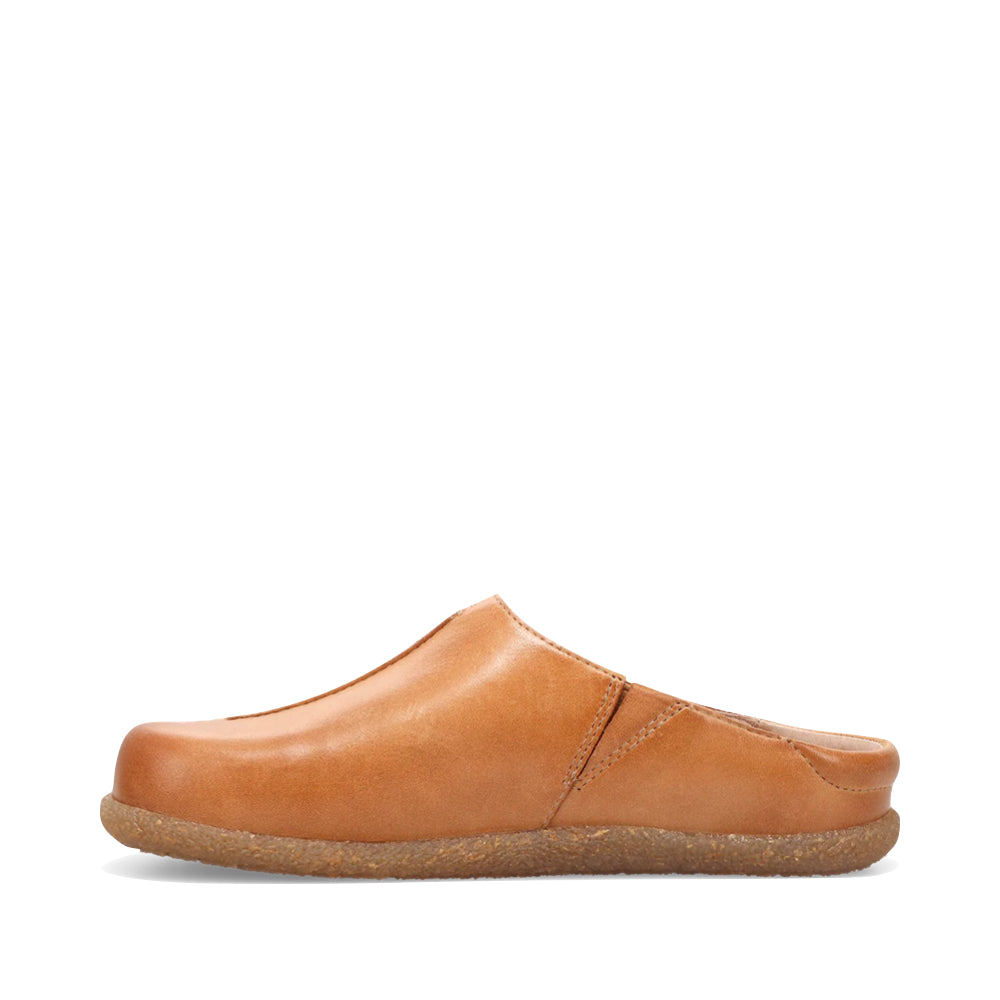 Side (left) view of Taos Upside Leather Slip On Clog for women.