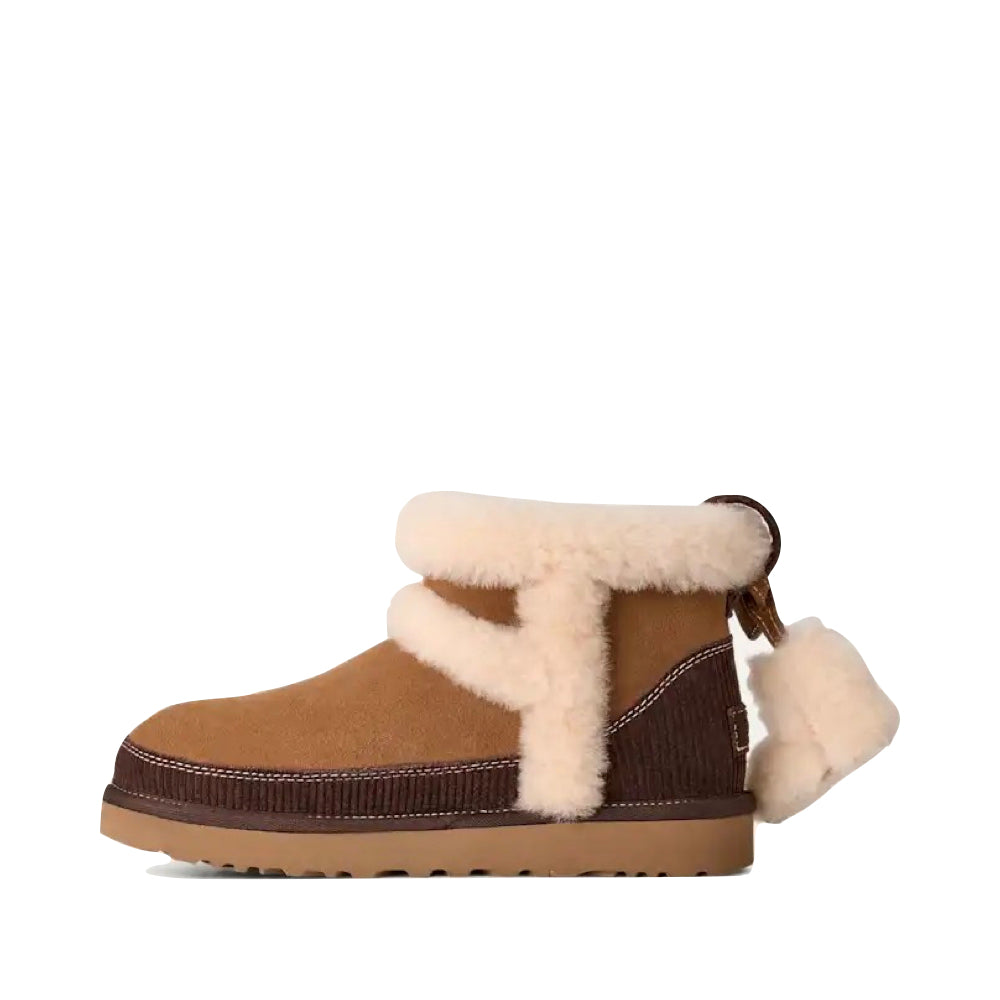Side (left) view of UGG Classic Mini Heritage Boot for women.