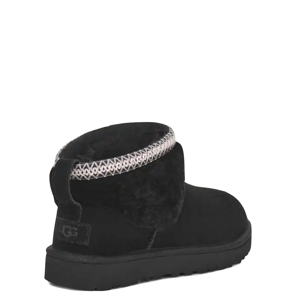 Heel view of Ugg Classic Ultra Mini Maxi Curly Boot for women.